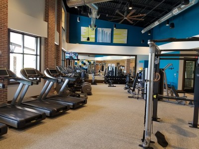 fitness area with treadmills on left