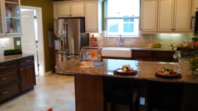 kitchen island with cabinets in background