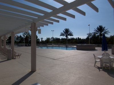 looking at Outdoor Pool from under Pergola 