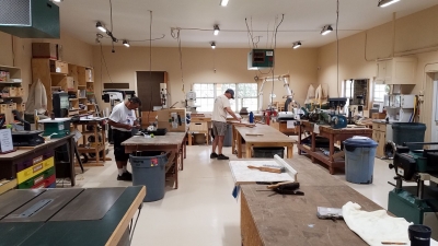 picture of wood shop with work tables and shop equipment