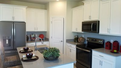 white kitchen cabinets, GE appliances, quartz counter tops 