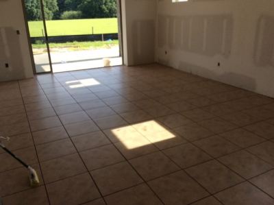 new tile floor in front of sliding glass door